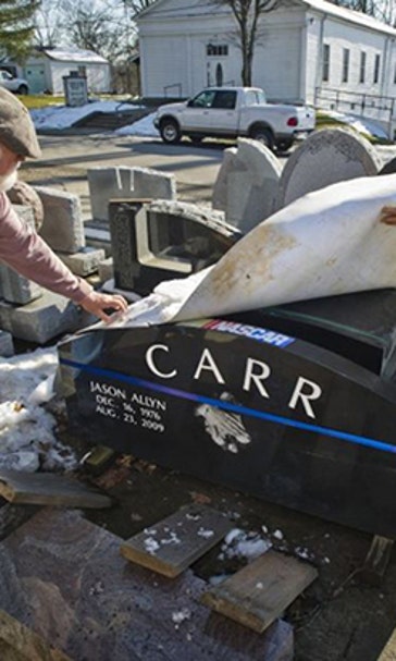 WIDOW SUING CHURCH OVER NASCAR-INSPIRED GRAVESTONE
